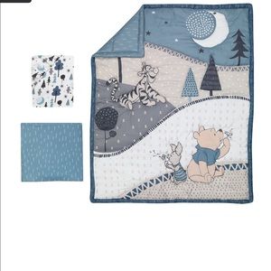 Disney Pooh, blue and gray crib bedding. Never used.